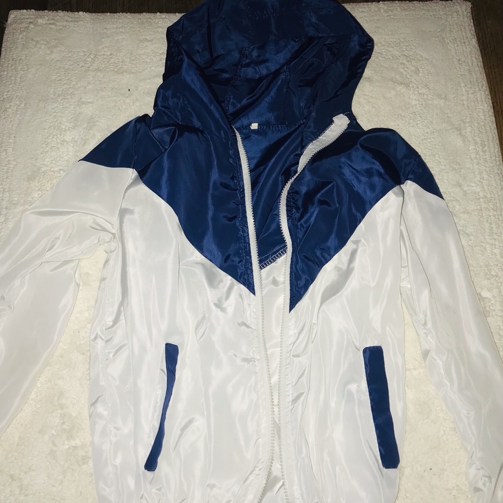 Blue and white windbreaker small
